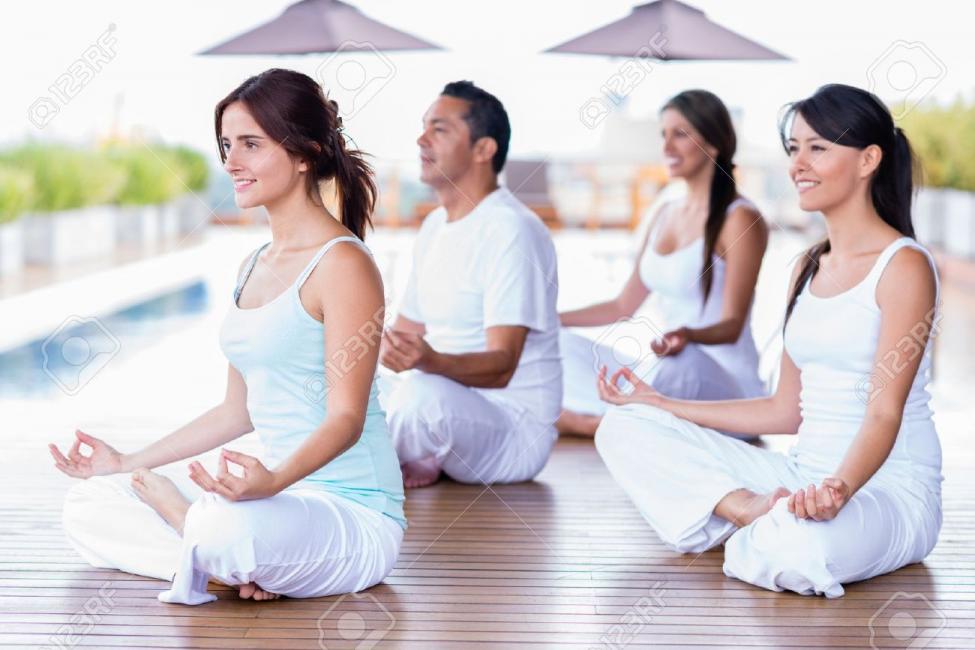 20042520-Group-of-yoga-people-in-a-class-meditating-Stock-Photo-meditation.jpg