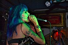 220px-Dinah_Cancer_45_Grave_Blue_Cafe_Long_Beach_4.jpg