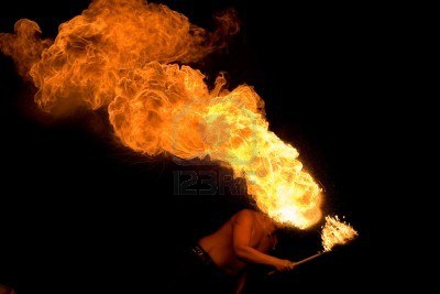 5409690-fakir-blowing-fire-from-his-mouth.jpg