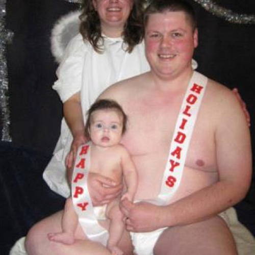 awkward-xmas-photos-man-diaper-baby-new-year.jpg