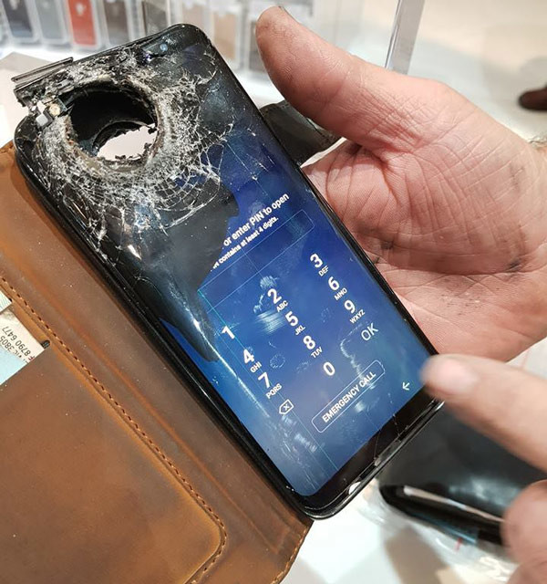 drilled-through-a-big-hole-the-samsung-smartphone-still-works-like-a-miracle-picture-1-30J4xCiwj.jpg