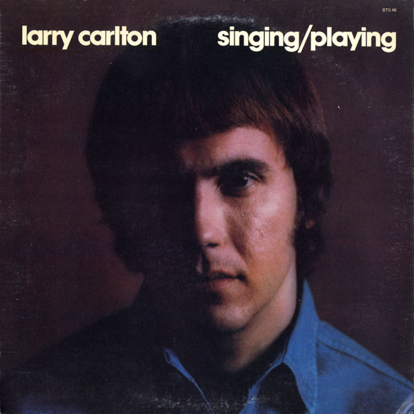 Larry Carlton - Singing_Playing.jpg