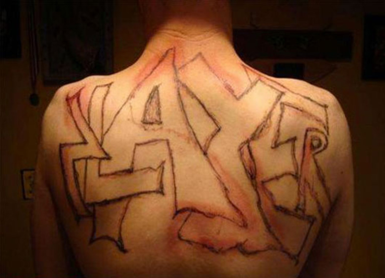 slayer-terrible-tattoojpg.jpeg