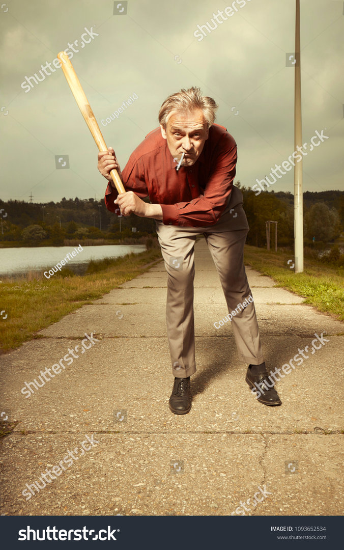 stock-photo-crazy-angry-older-man-with-baseball-bat-attacking-public-in-park-1093652534.jpg