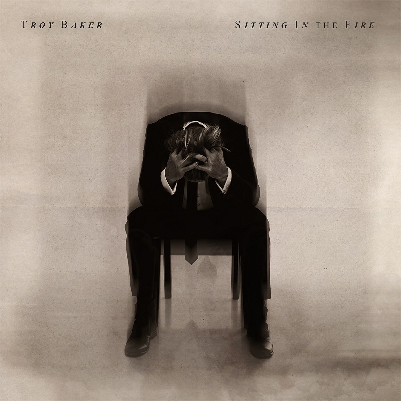 troy-baker-sitting-in-the-fire-cover.jpg