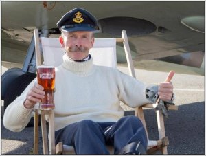 Sq.Ldr Charles Brown with a Spitfire.jpg