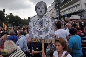 protester-plackard-german-chancellor.jpg