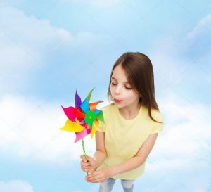 depositphotos_65463815-stock-photo-smiling-child-with-colorful-windmill.jpg