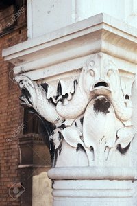 23044250-close-up-of-fish-decorated-column-in-historical-rialto-market-venice.jpg